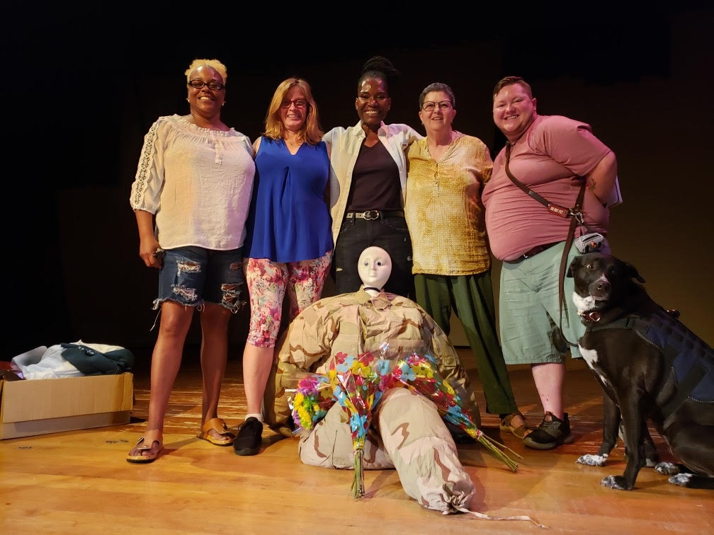 Life Stories participants gather on stage